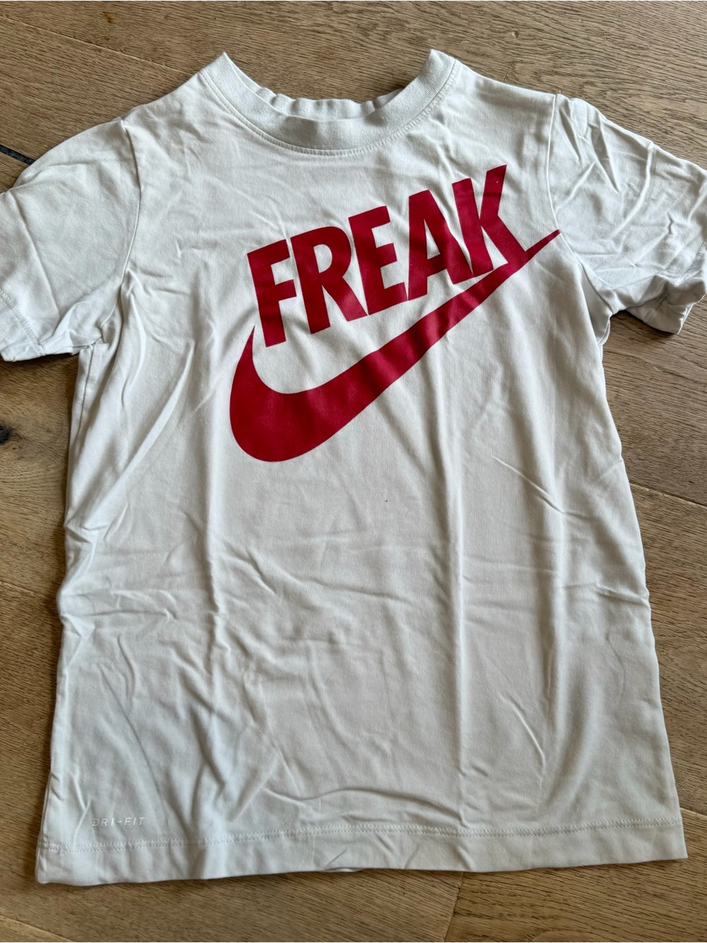 Nike Kids White Tee with Red "FREAK" Logo
